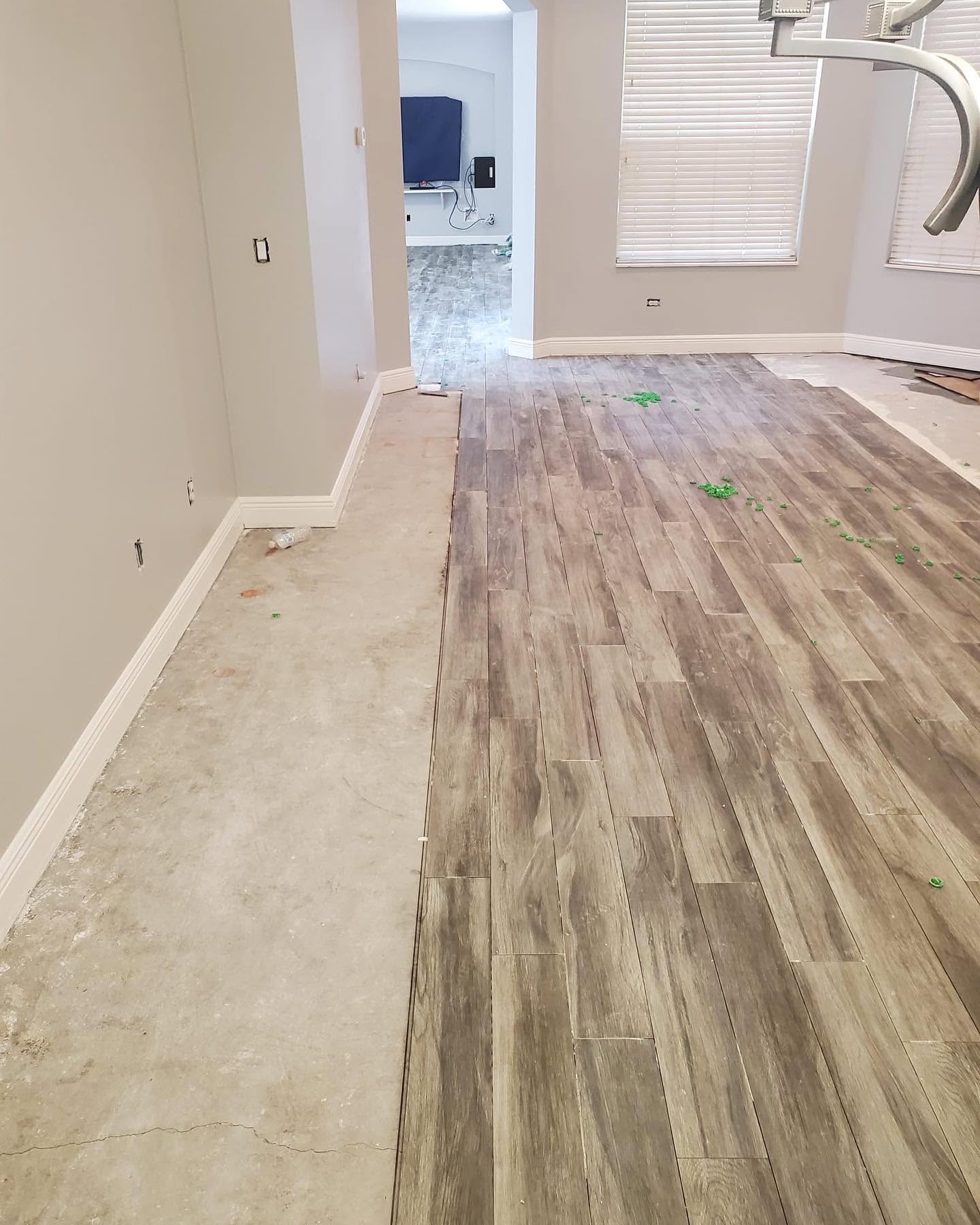Plank flooring installation by Multiservices Even LLC